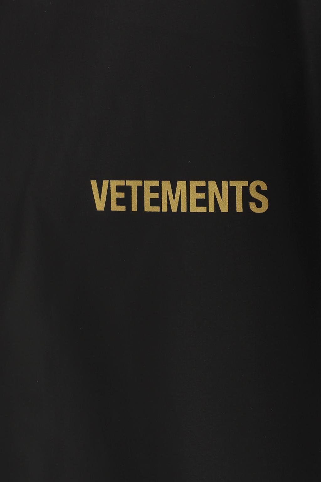 Black Raincoat with logo VETEMENTS - Vitkac Canada